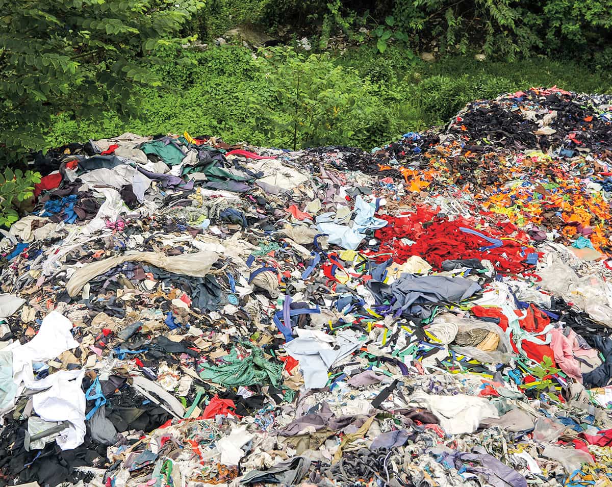 A large pile of trash in a landfill