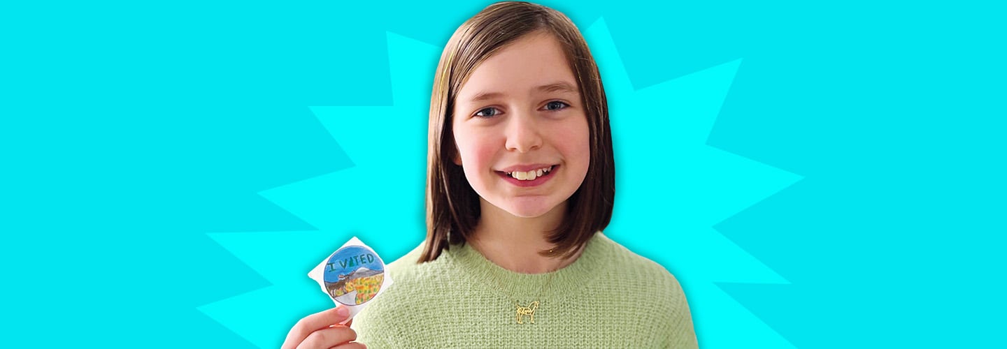 Image of a student holding up an "I Voted" sticker