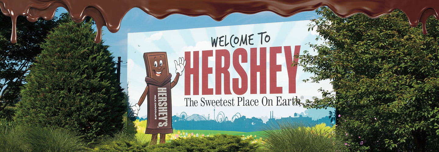 Image of road sign with text, "Welcome to Hershey, the sweetest place on Earth"